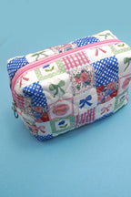 QUILTED FLORAL POUCH