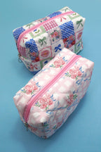 QUILTED FLORAL POUCH