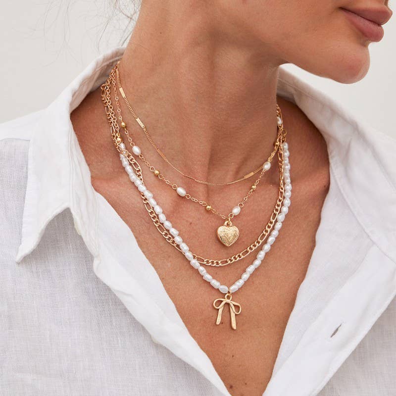 BOW PEARL PENDANT LAYERED NECKLACE