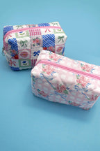 QUILTED FLORAL POUCH