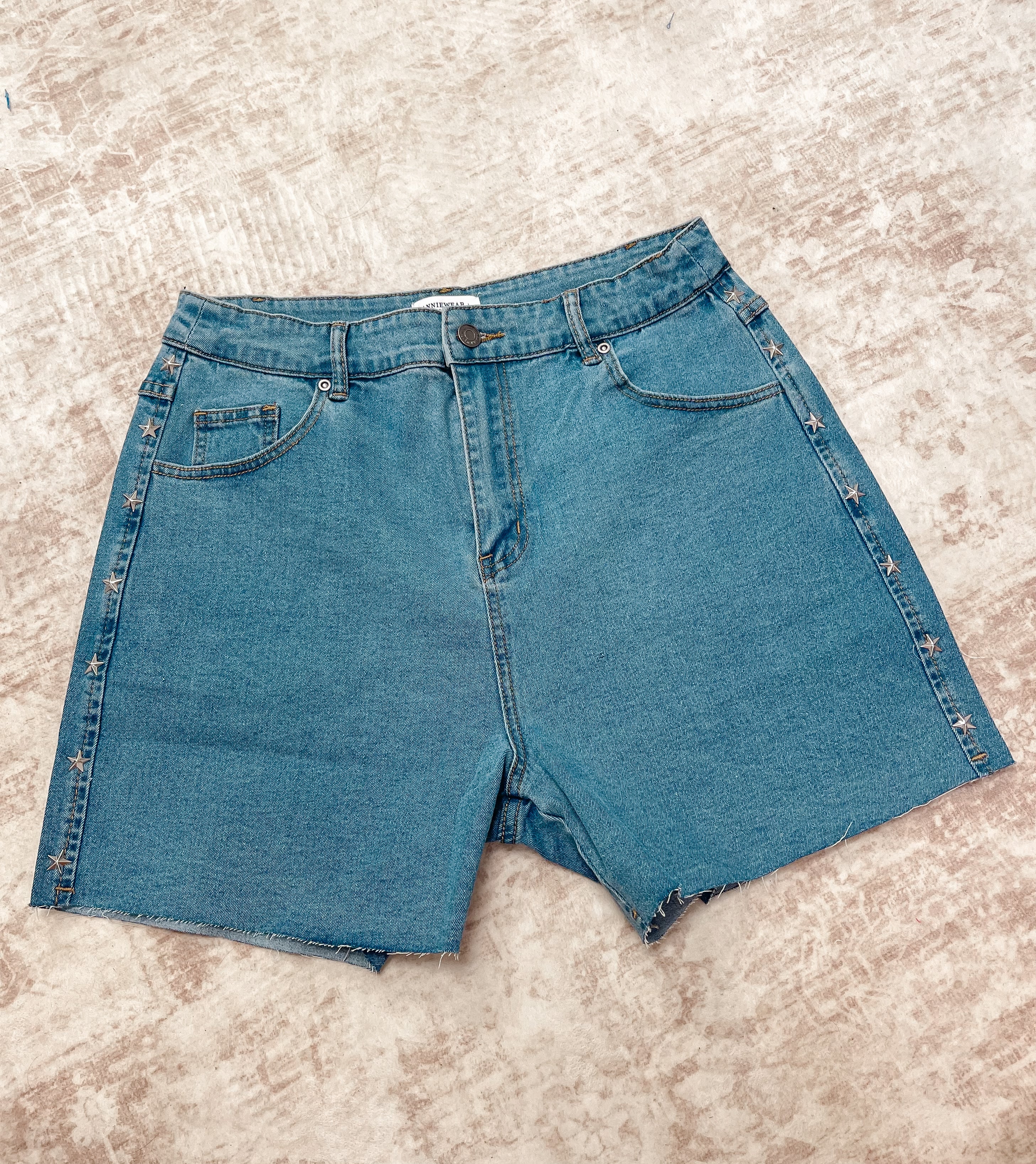 Star studded stretch denim shorts