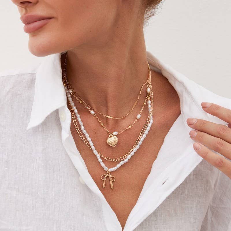 BOW PEARL PENDANT LAYERED NECKLACE