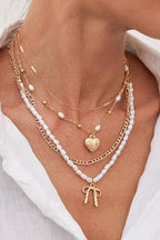 BOW PEARL PENDANT LAYERED NECKLACE